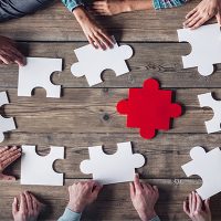 Hipster business successful teamwork concept, business group assembling jigsaw puzzle